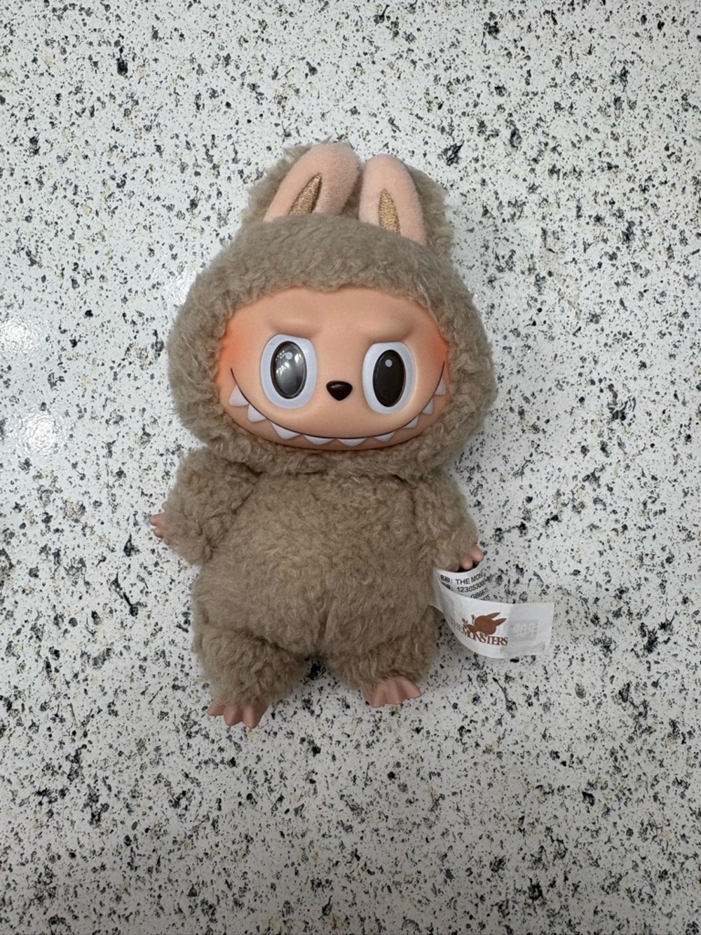 Mystery Plush Bunny Key & Card Holder - Taupe. /toast